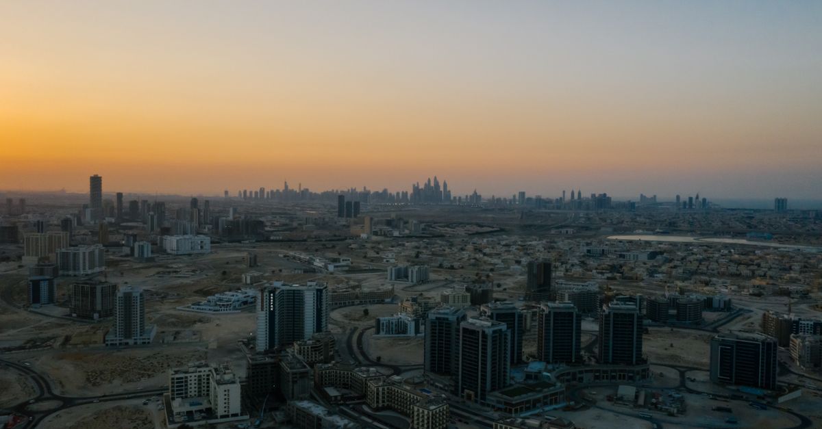 Aerial view of Dubai's urban sprawl at dawn
