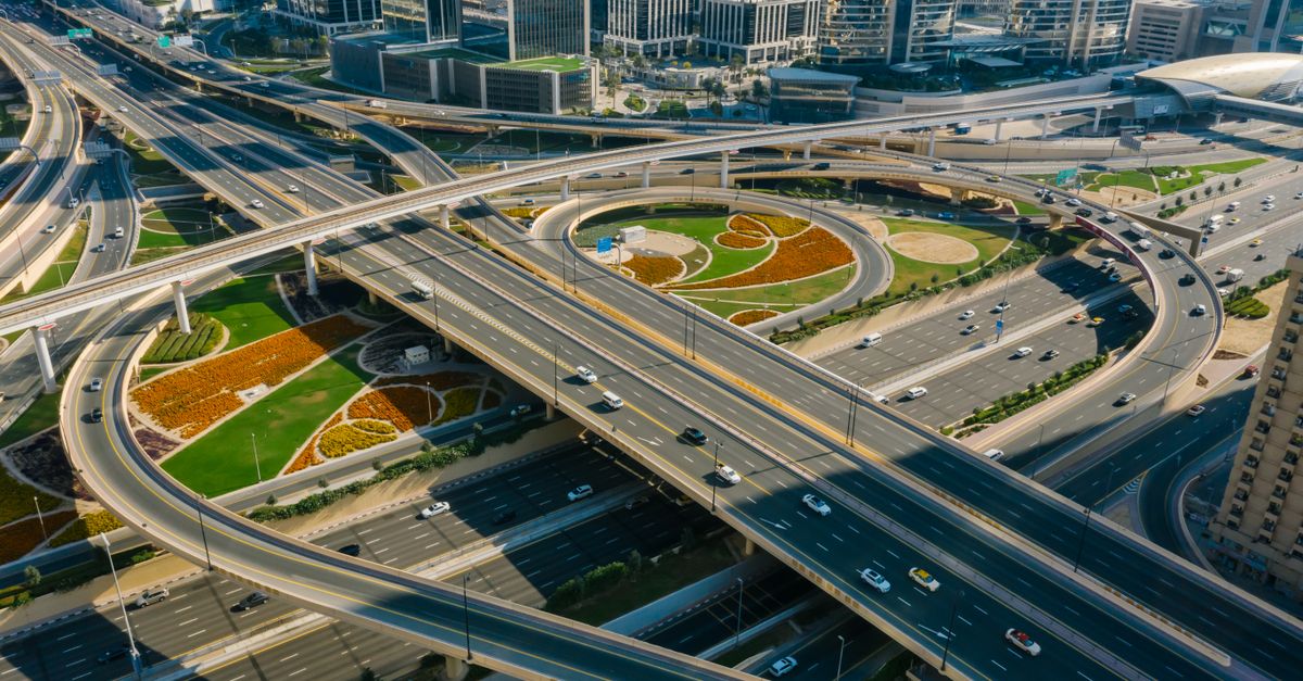 Aerial view of a multi-level highway interchange in Dubai
