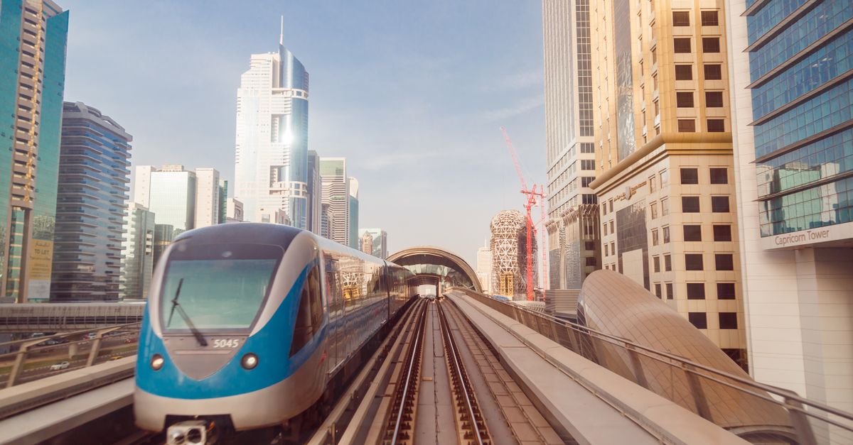 A Dubai Metro train travelling through the city